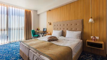 Minibar, coffres-forts dans les chambres, décoration personnalisée