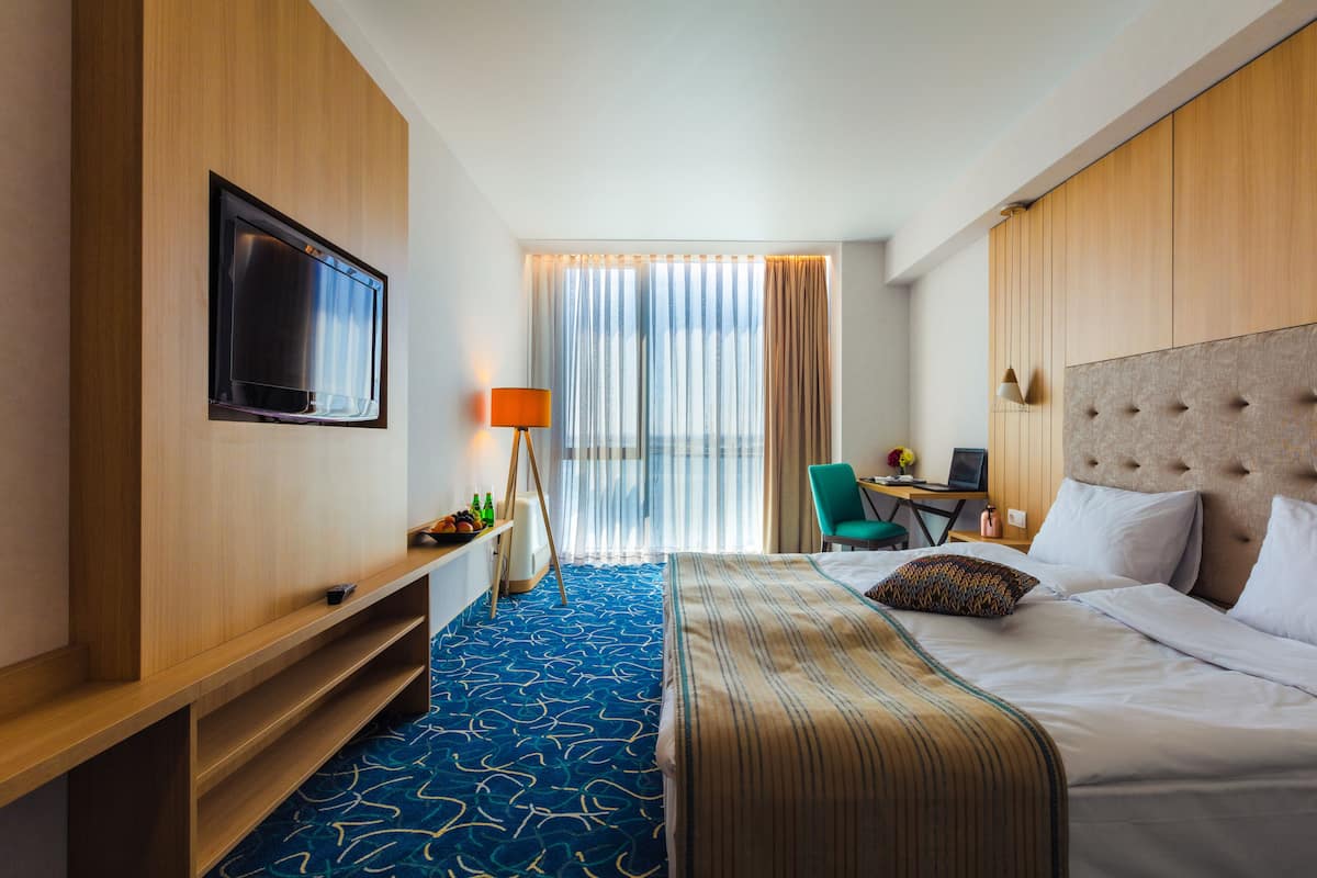 Comfort Double or Twin Room, Sea View | Minibar, in-room safe, desk, laptop workspace
