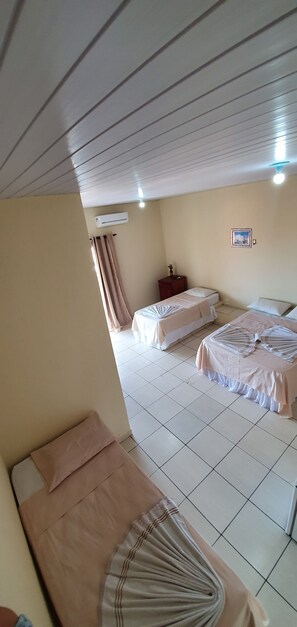 Standard Quadruple Room | Minibar, individually decorated, free WiFi, bed sheets - Hotel Brisas (Salinópolis)