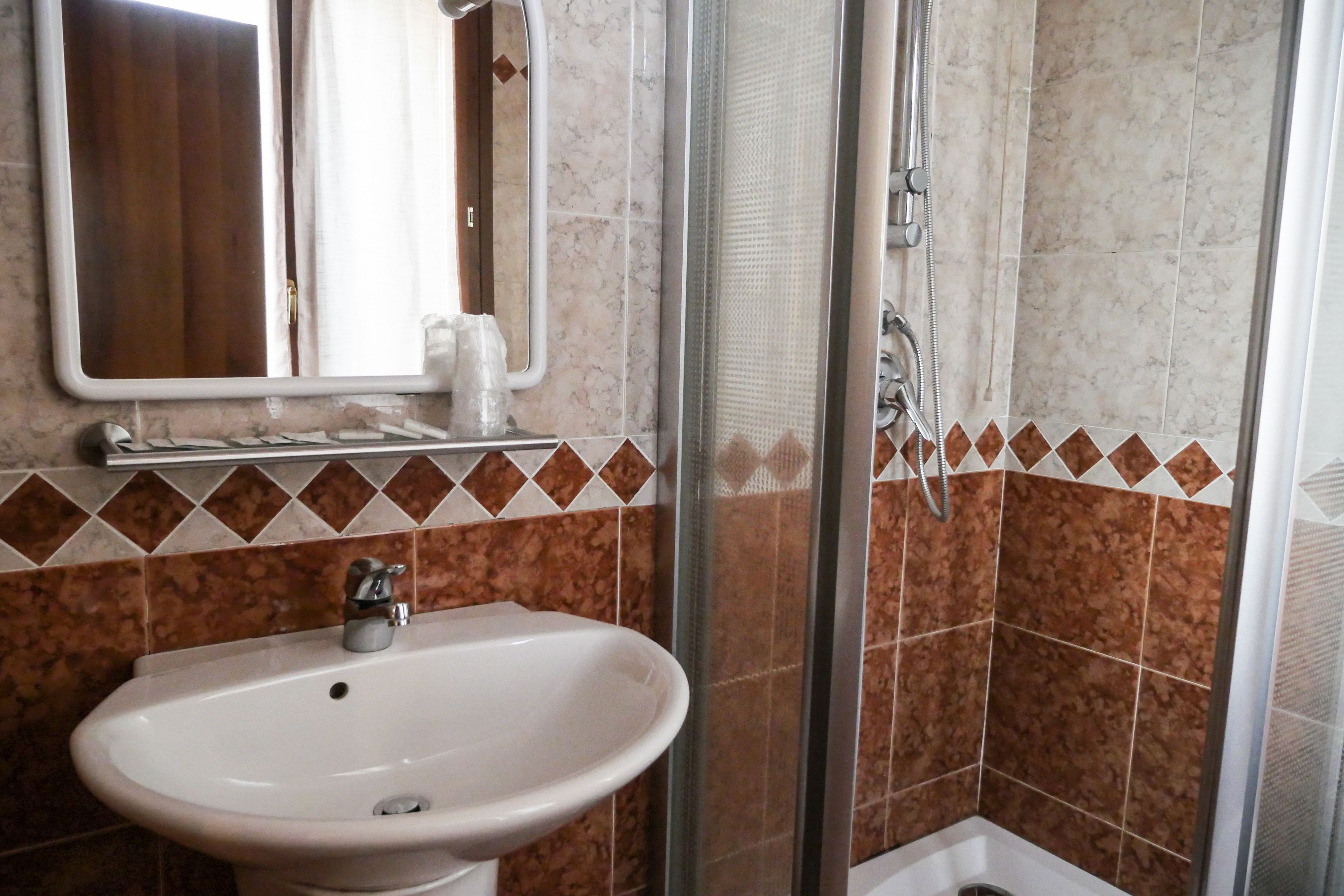 classic triple room | bathroom | shower, rainfall showerhead, free toiletries, hair dryer