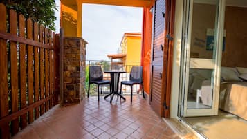 Double Room, Terrace, Sea View | In-room safe, desk, free WiFi, bed sheets