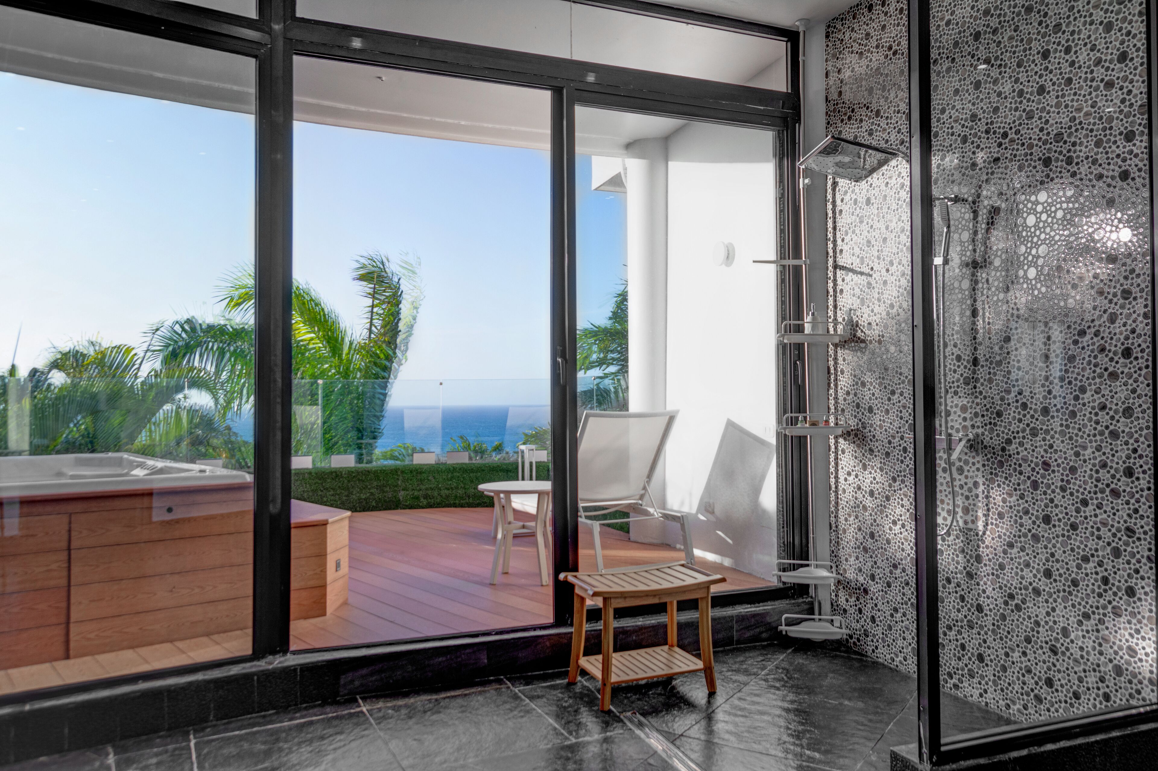 Shower, rainfall showerhead, towels, soap