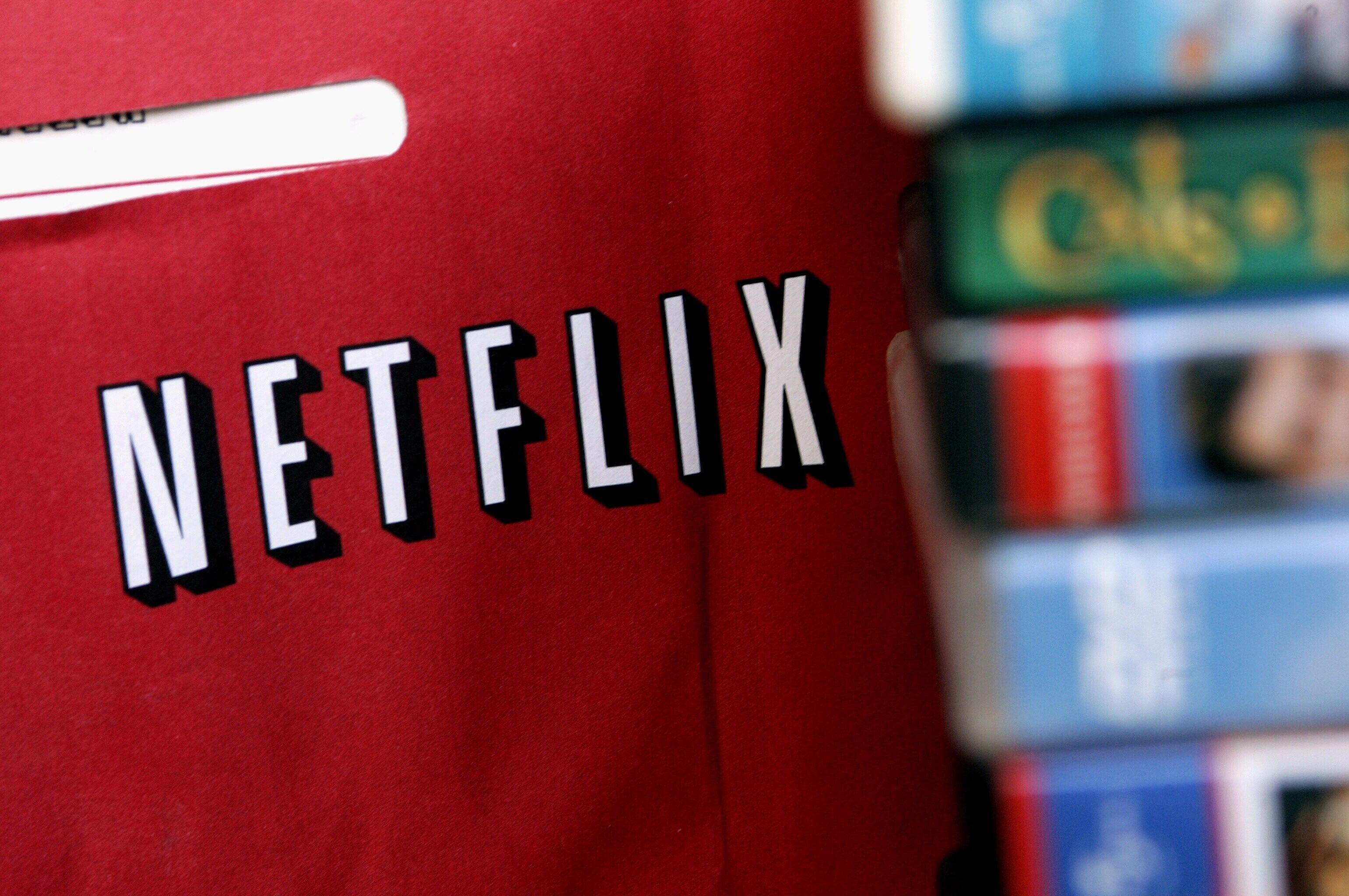 A red bag with the word "NETFLIX" printed on it.