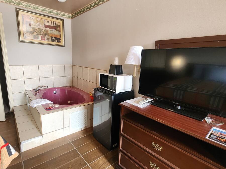 Svit - 1 kingsize-säng - rökare - bubbelpool | Gratis wi-fi och sängkläder