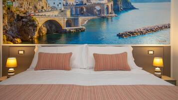 Premium bedding, memory foam beds, minibar, in-room safe