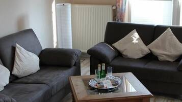 Apartment, Ground Floor | Living room | TV