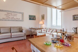 Apartment, 1 Bedroom | Living area | Flat-screen TV - The Quietest Corner of Trastevere, AC & Elevator (Rome)