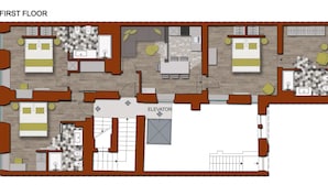 Plano de planta de un hotel en el primer piso, con varias habitaciones, una cocina, un comedor y un ascensor.