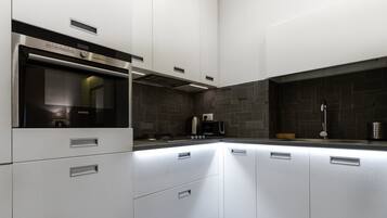 Apartamento (1 Bedroom) | Cocina privada | Frigorífico, microondas, horno y lavavajillas