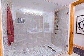 Combined shower/tub, hair dryer, towels, soap