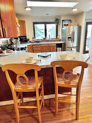 Fridge, microwave, oven, stovetop - Peaceful Island Retreat on Foys Lake MT – Hot Tub, Private Dock, Beach & Kayaks! (Kalispell)