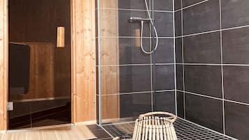 Bathtub, jetted bath, hair dryer, toilet paper