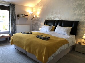 1 habitación, tabla de planchar con plancha, wifi gratis y ropa de cama 