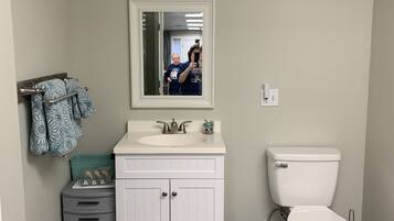 Combined shower/tub, hair dryer, towels, soap