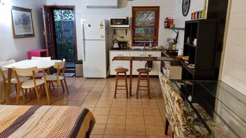 Fridge, microwave, stovetop, coffee/tea maker