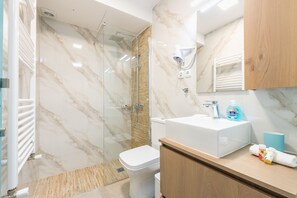 Shower, hair dryer, soap, shampoo