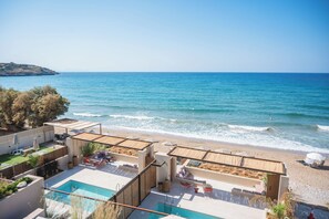 On the beach, sun loungers, beach towels