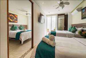 Suite familiar | Ropa de cama de alta calidad y edredones de plumas