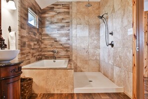 Bathtub, hair dryer, towels, soap