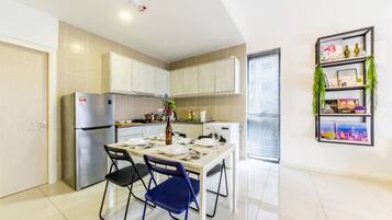 Fridge, electric kettle, cookware/dishes/utensils, spices