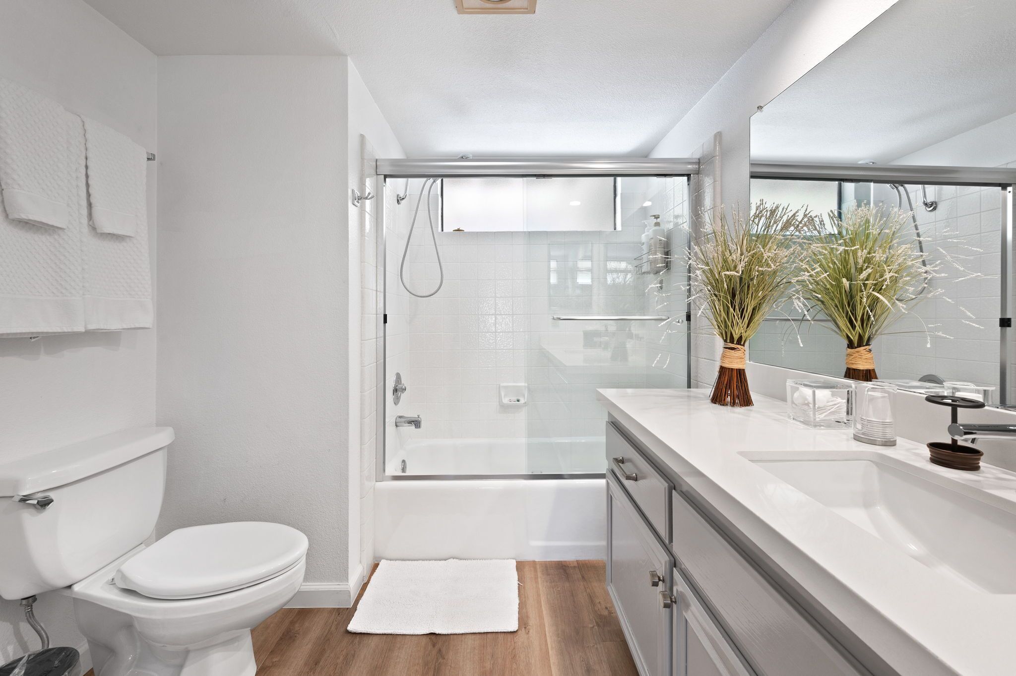 Bathtub, hair dryer, towels, soap