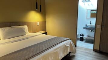 Deluxe Room | Premium bedding, individually furnished, blackout drapes, free WiFi