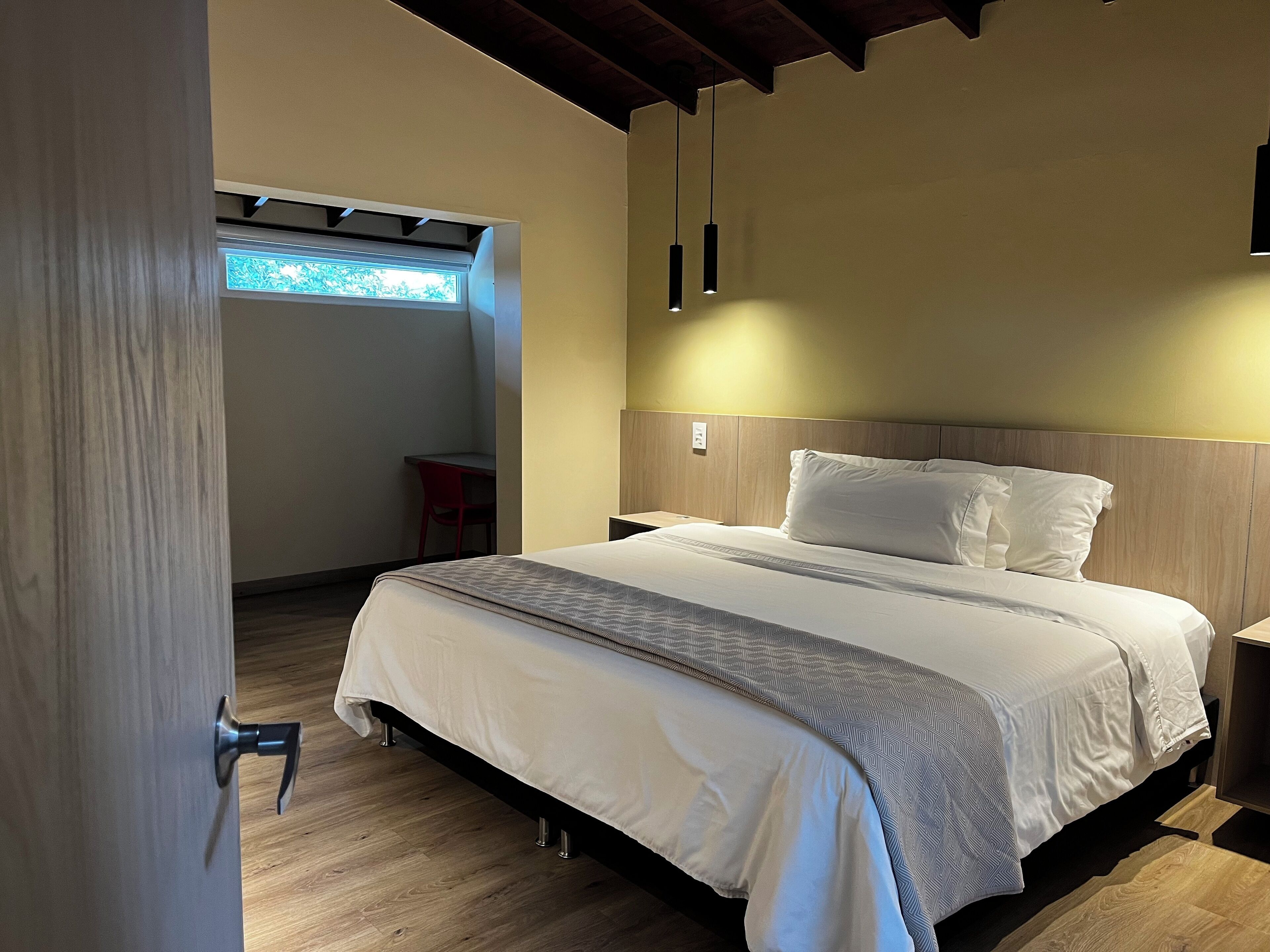 deluxe room | 1 bedroom, premium bedding, individually furnished, blackout curtains