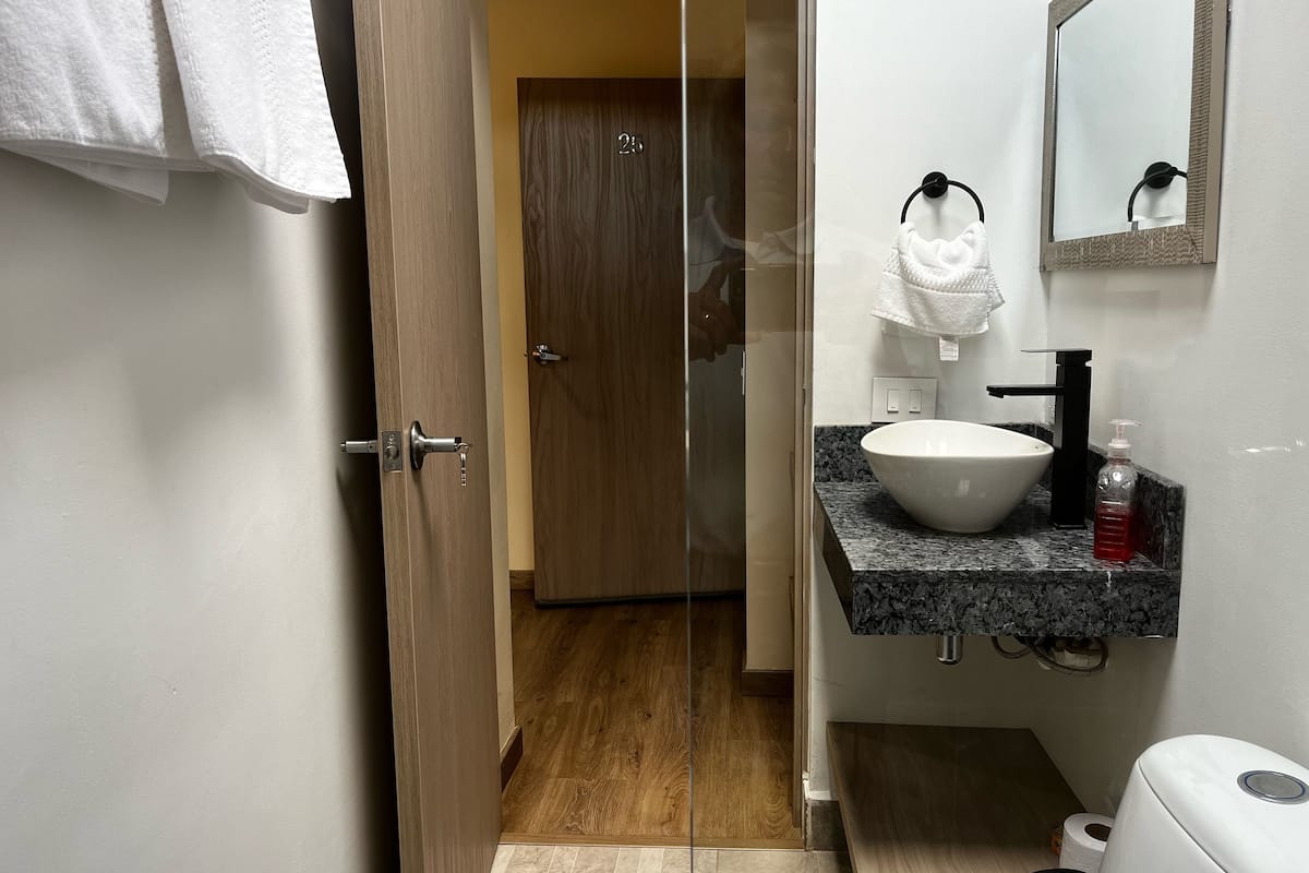 superior room, 1 king bed | bathroom | shower, designer toiletries, towels, soap