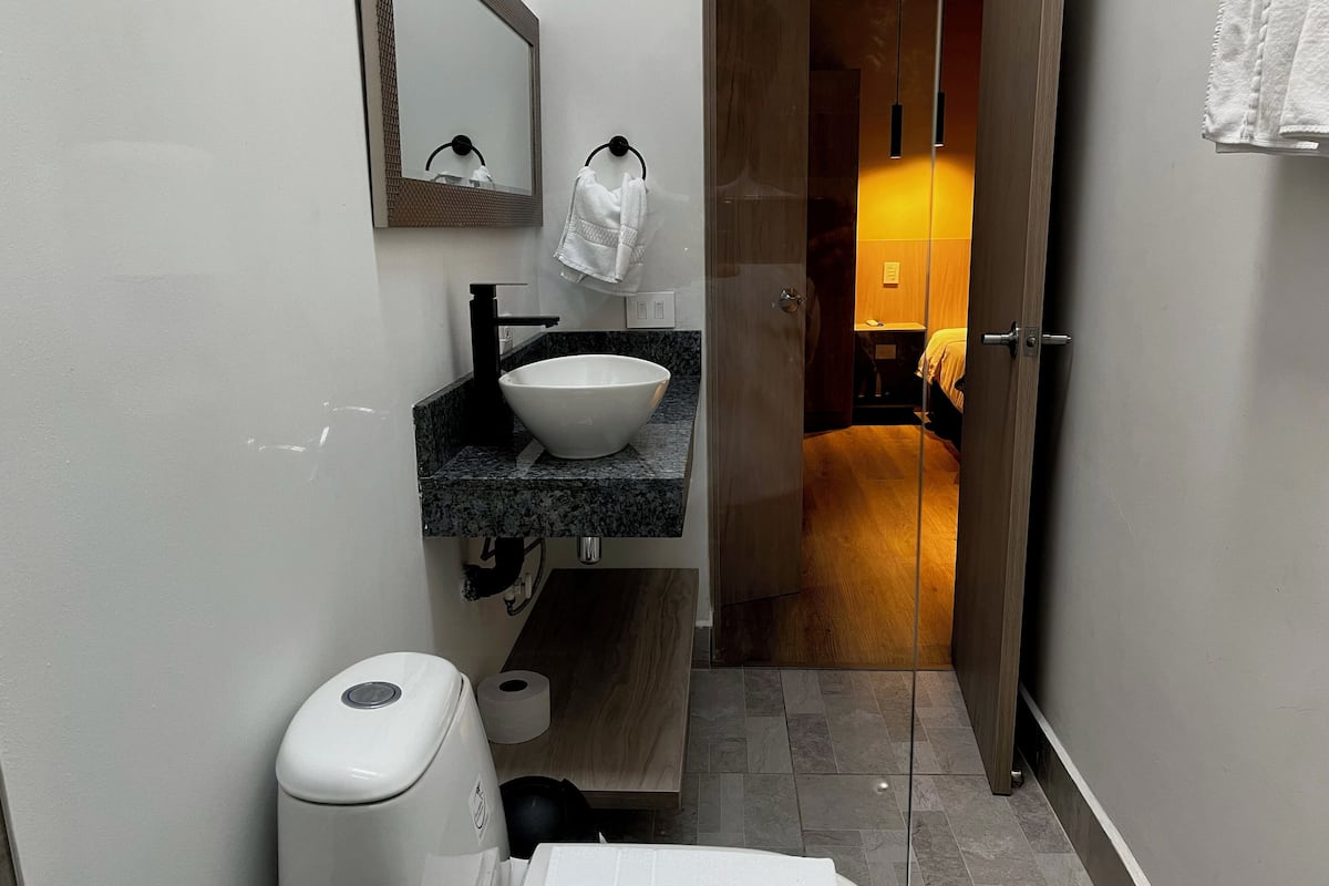 family room | bathroom | shower, designer toiletries, towels, soap