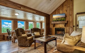 Flat-screen TV, fireplace, foosball