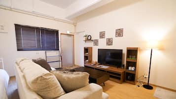 Privately Reserved Floor up to 8 Guests | Living area | TV