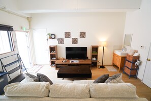 Privately Reserved Floor up to 8 Guests | Living area | TV - Condominium Hotel Omoromachi (Naha)