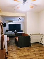 Family Suite | Living area | Flat-screen TV