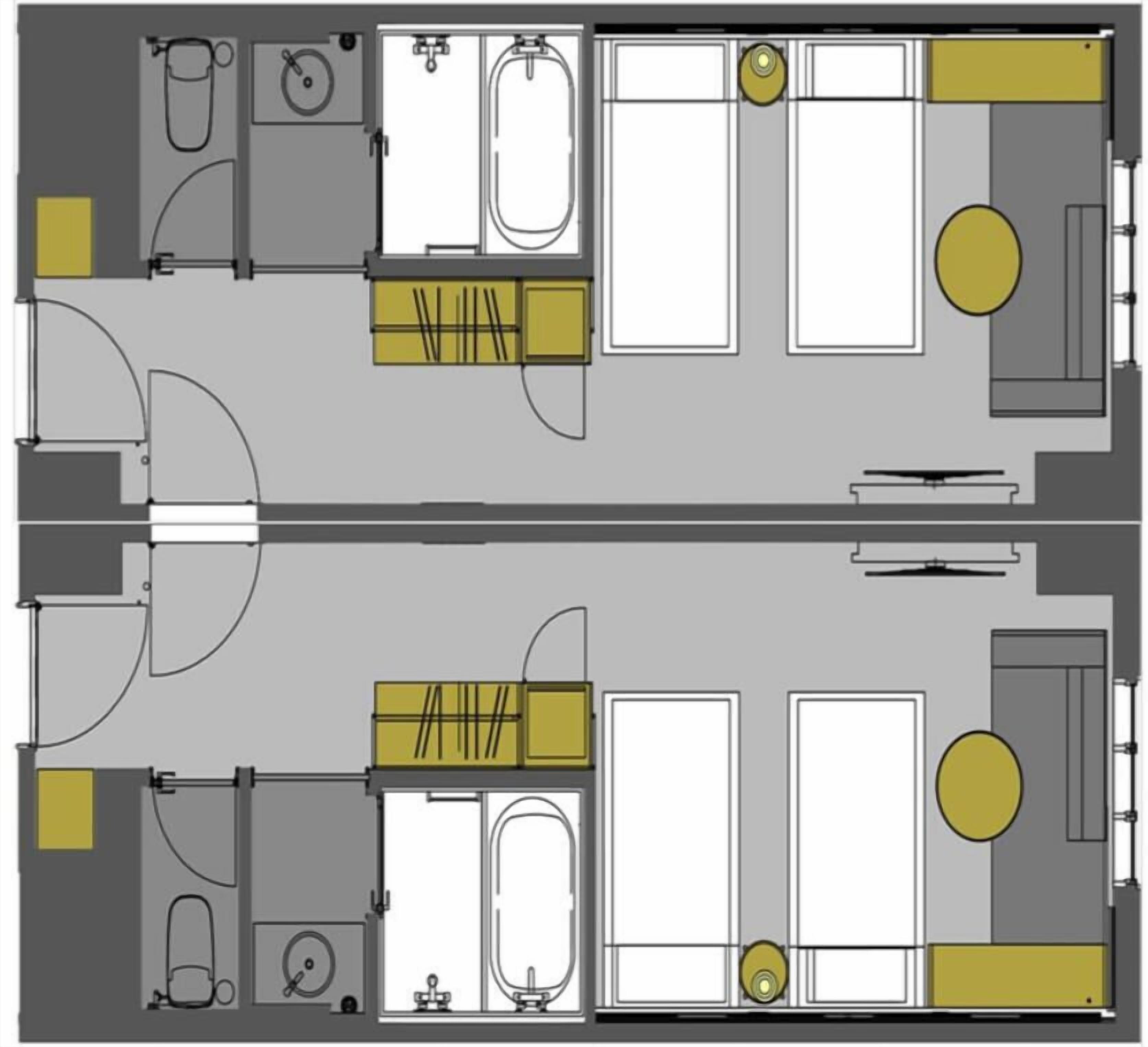 A floor plan of a hotel room with a bathroom, a kitchenette, a seating area, and a window.