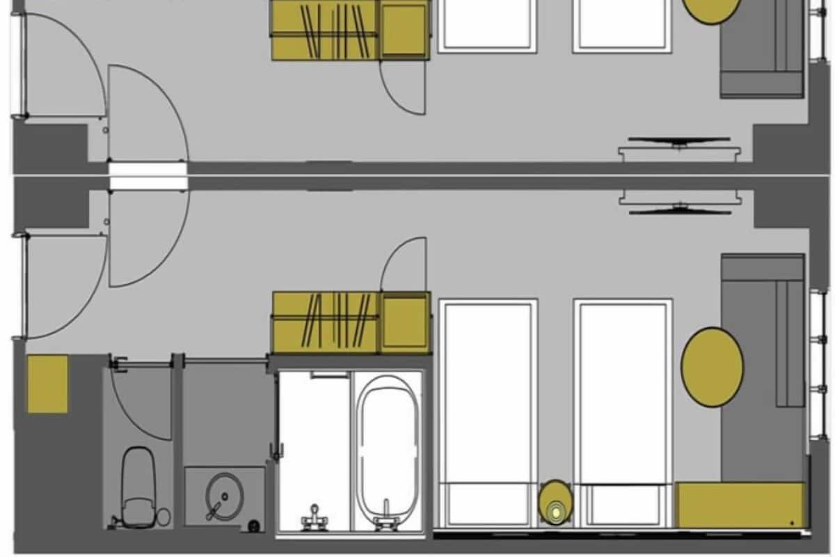 Plano de planta de una habitación de hotel con baño, kitchenette, zona de estar y ventana.