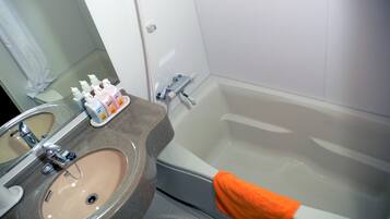 Separate bathtub and shower, free toiletries, hair dryer