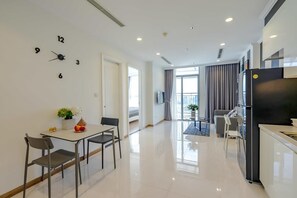 Appartement, 1 slaapkamer | Woonruimte | Een lcd-televisie