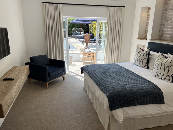 Executive Room, Non Smoking, Pool View | Premium bedding, down duvets, Tempur-Pedic beds, free minibar items