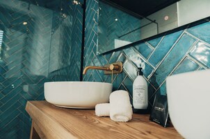 Shower, rainfall showerhead, designer toiletries, hair dryer