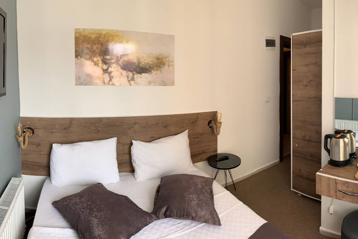 Chambre Junior | Literie de qualité, minibar, accès au Wi-Fi (inclus), literie fournie