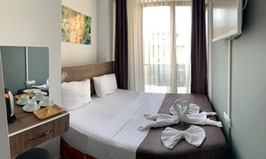 Quarto design | Roupas de cama premium, frigobar, Wi-Fi de cortesia, roupa de cama
