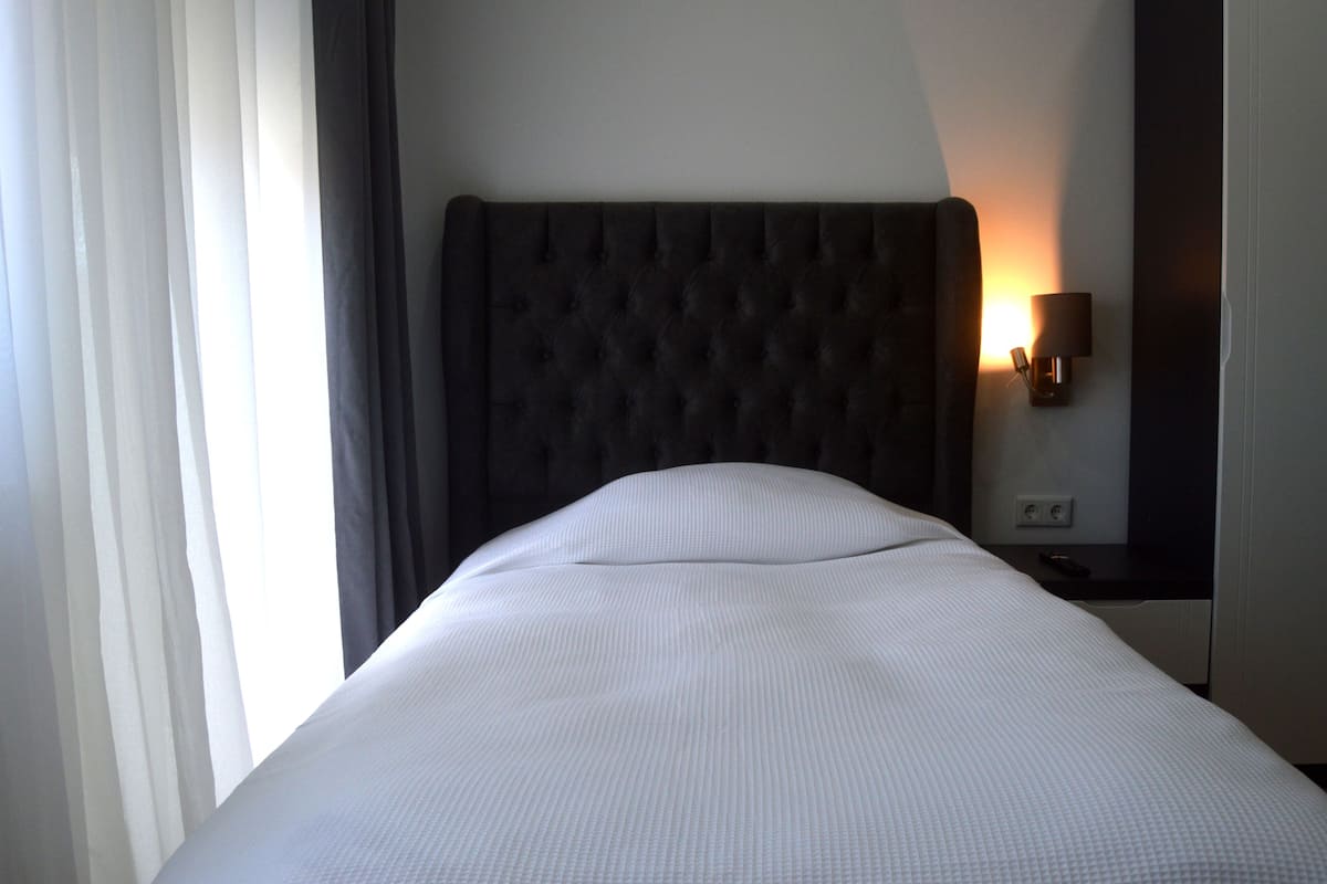 Eenpersoonskamer, privébadkamer | 1 slaapkamer