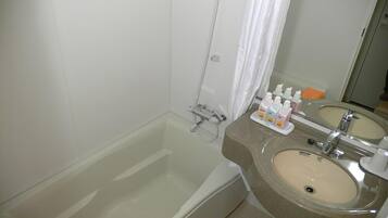 Separate bathtub and shower, free toiletries, hair dryer