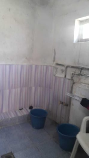 Shower, towels, soap, toilet paper