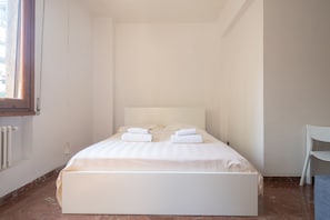 City Apartment | 4 bedrooms, premium bedding, down comforters, individually furnished