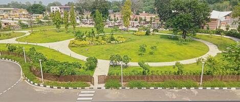 A landscaped garden with pathways and greenery.