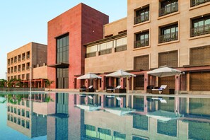 Indoor pool, outdoor pool, open 7:00 AM to 8:00 PM, pool loungers - Ramada Encore by Wyndham Statue of Unity (Garudeshwar)