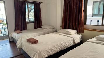 Deluxe Triple Room, Non Smoking, Garden View | Premium bedding, blackout drapes, free WiFi, bed sheets