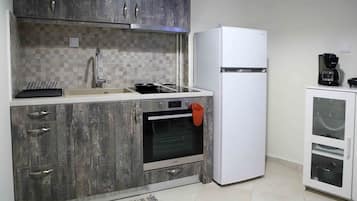Deluxe Apartment, 2 Bedrooms, Balcony, City View | Private kitchen | Full-size fridge, oven, stovetop, coffee/tea maker