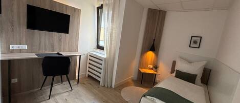 Einzelzimmer | Schreibtisch, kostenloses WLAN, Bettwäsche